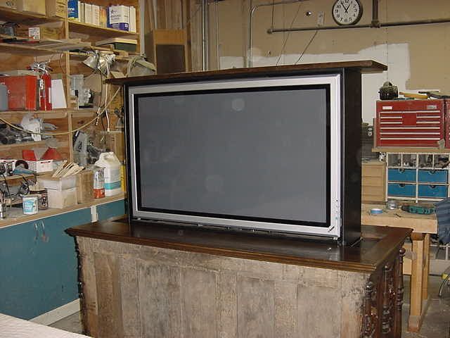 Plasma in antique cabinet rear