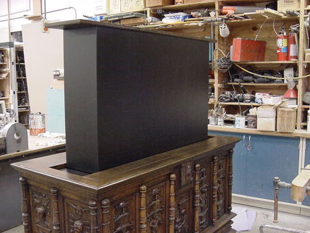 Plasma in antique cabinet front