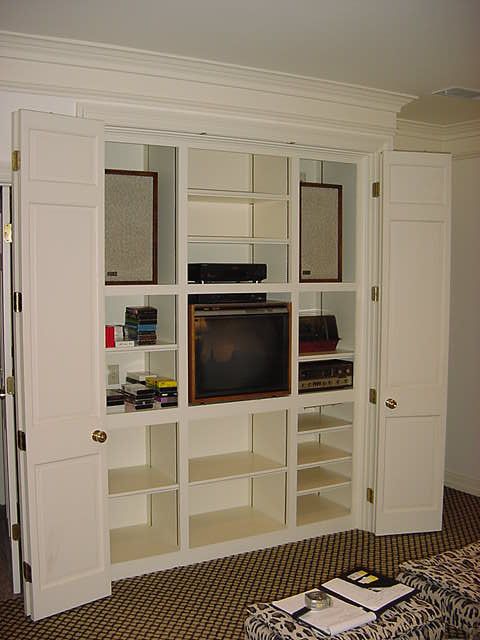 Bifold cabinet before