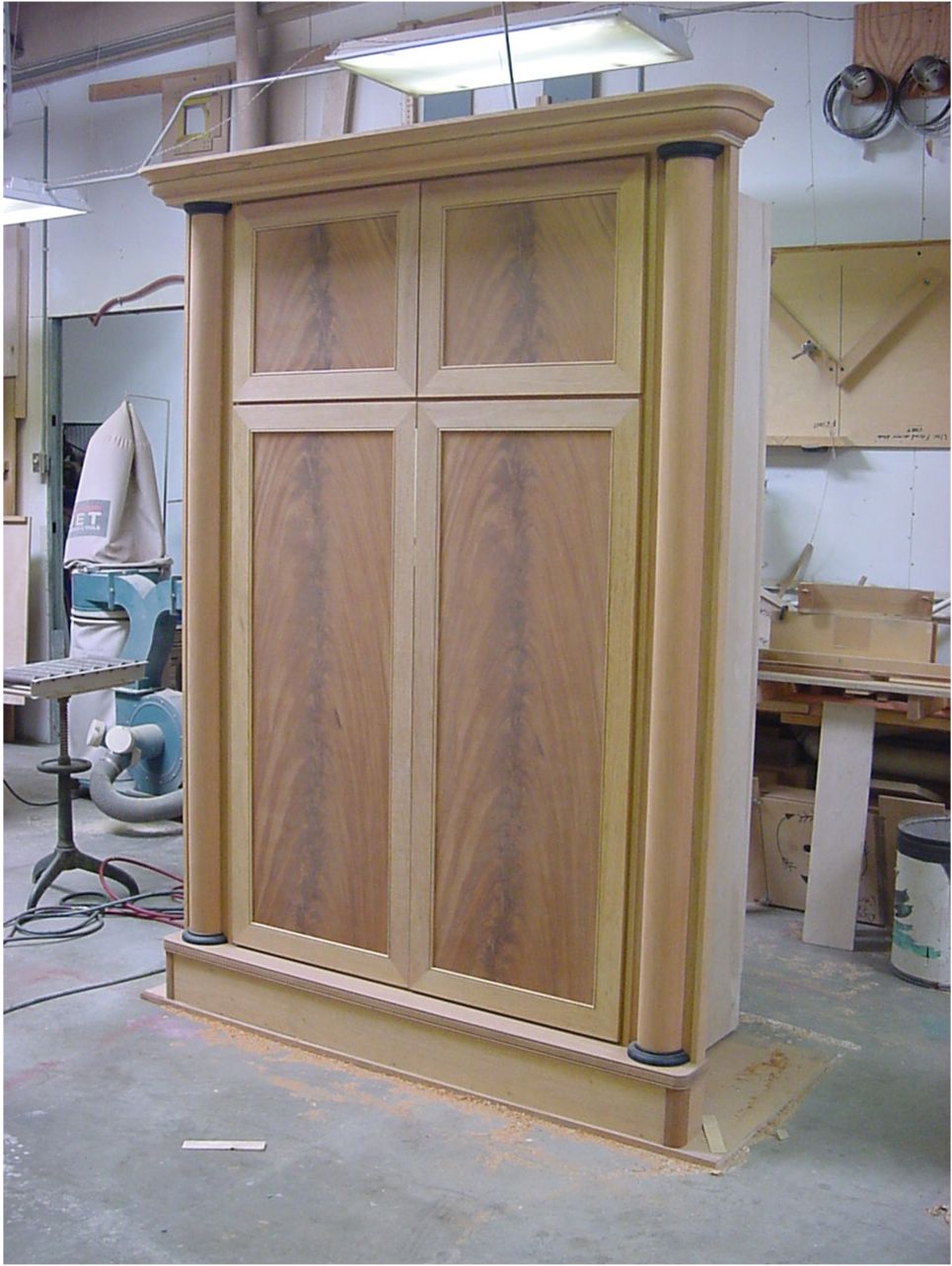 Cabinet in shop complete and unfinished.