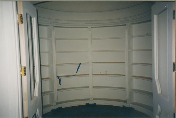 Curced bookcase installed